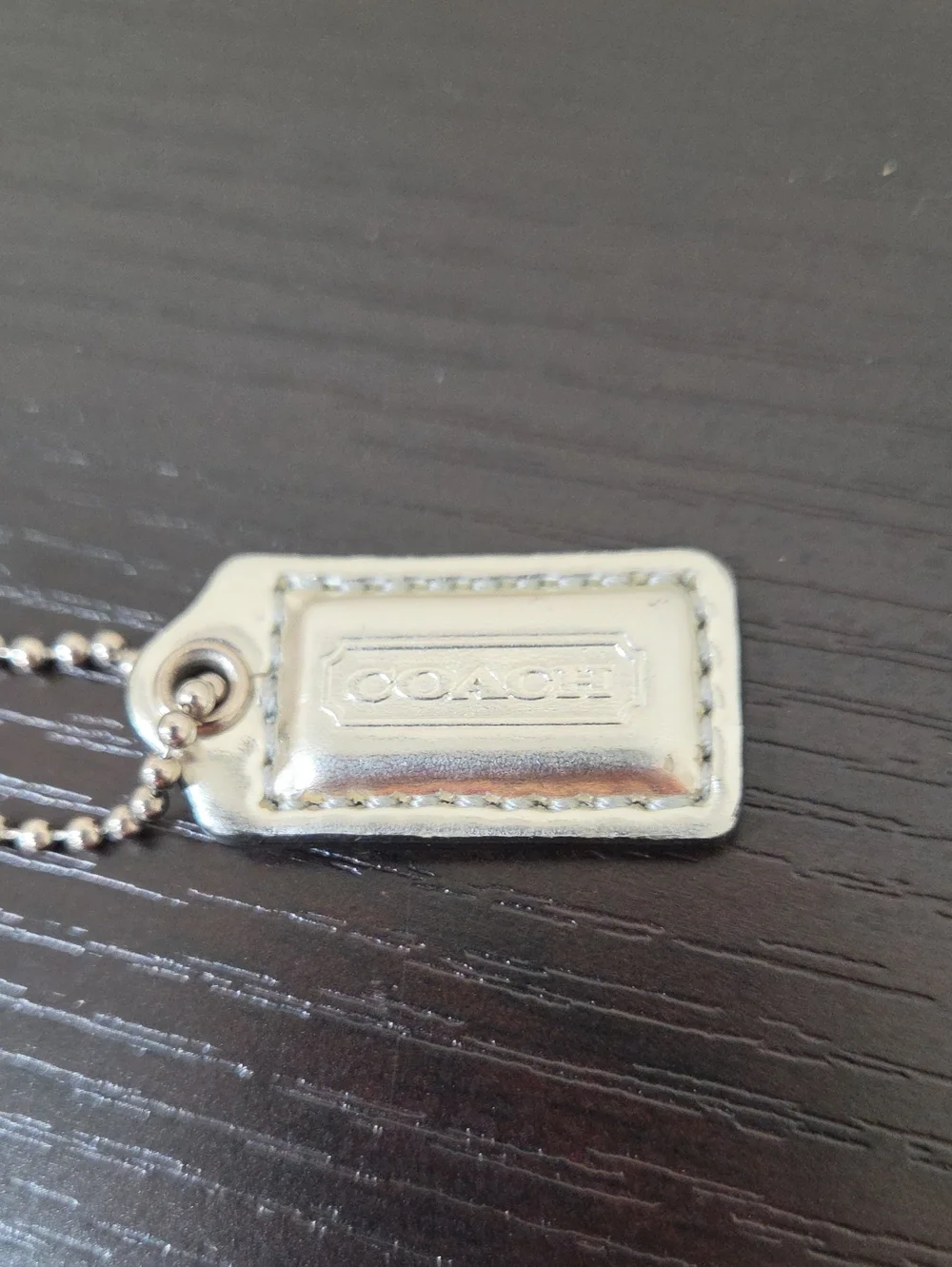 Coach Silver Leather Small Hang Tag
